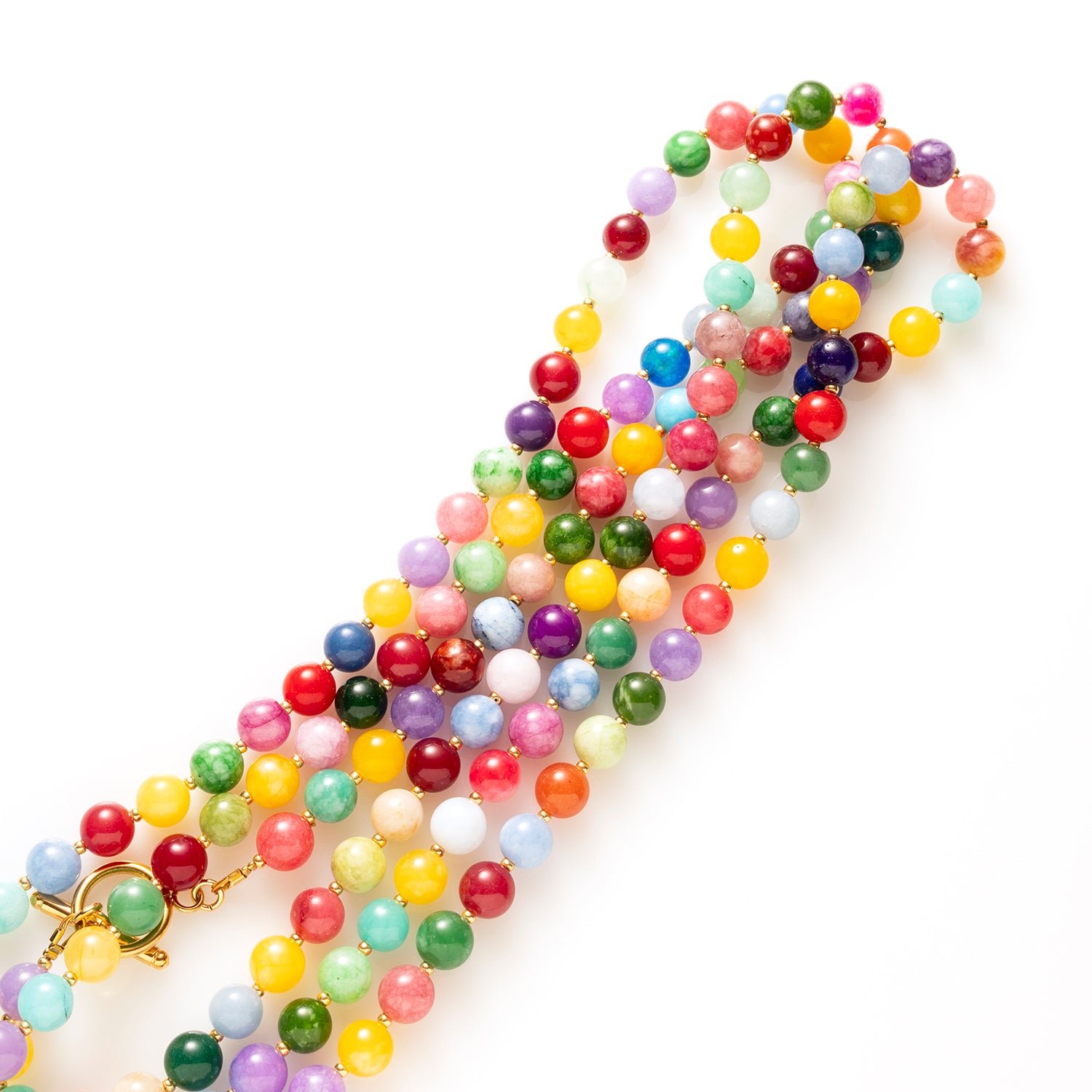 Laat je meevoeren naar de bruisende straten van Rio met de Rio Radiance ketting – een explosie van kleur, energie en zomerse vibes. Deze vrolijke kralenketting is handgemaakt met natuurstenen in allerlei tinten die samen een speels en krachtig geheel vormen. Elke kraal is uniek, net als jij. Draag haar solo als statement of kies je eigen bedel en creëer zo je eigen unieke look.