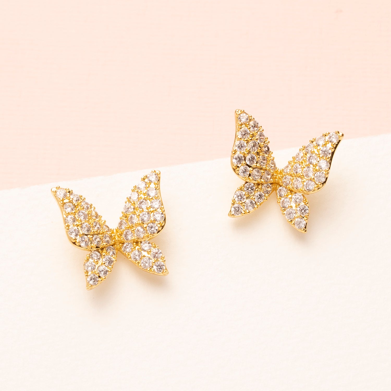 18kt Gold Plated oorstekers met zirkonia vlinders.