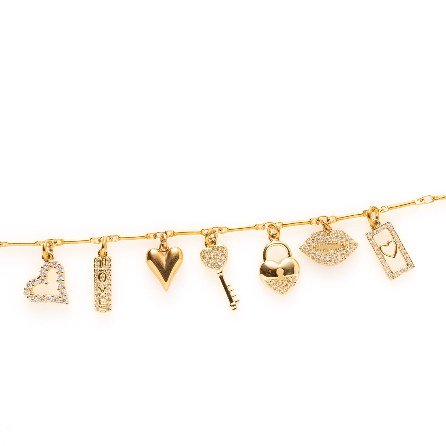 Ontdek de Whispers of Love armband, een verfijnde bedelarmband vol betekenis. De zorgvuldig gekozen bedels – van hartjes en lipjes tot een sierlijke sleutel – maken dit sieraad tot een prachtige mix van elegantie en speelsheid. Deze armband is perfect om cadeau te geven aan iemand die je liefhebt of als bijzondere toevoeging aan je eigen sieradencollectie.