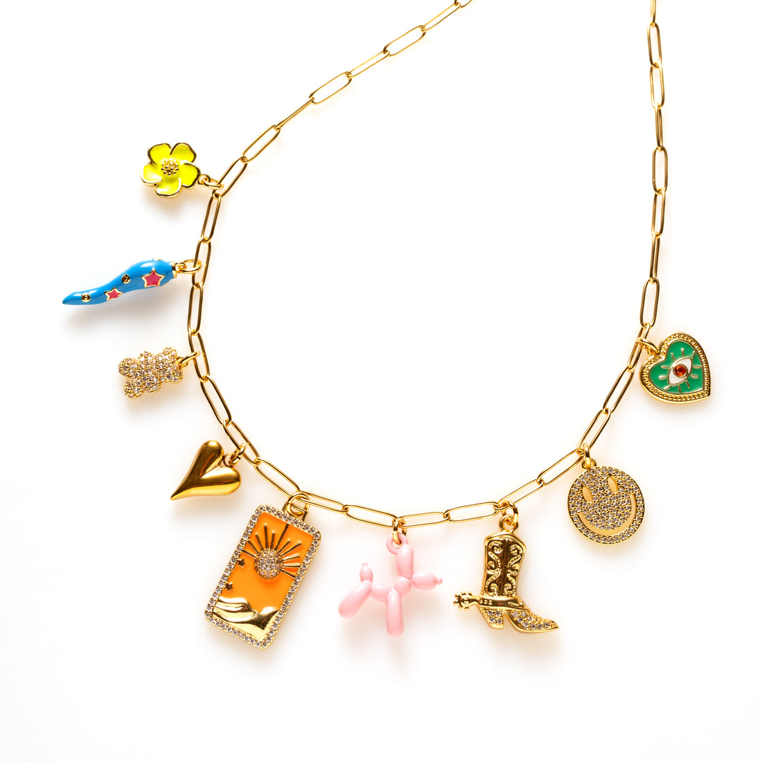 Orange Crush bedelketting met oranje tarotkaart, bloem, peper, smiley en meer. Speels, kleurrijk en vol energie – een must-have voor de avontuurlijke ziel.