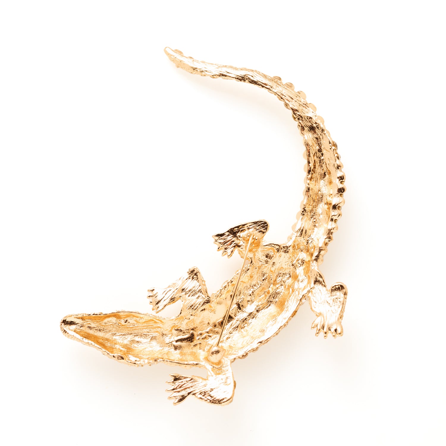 Durf op te vallen met de Alligator Spark broche. Groot, gedurfd en opvallend, ontworpen voor vrouwen die van sieraden een statement maken. Voeg kracht en eigenzinnigheid toe aan je outfit en laat je stijl spreken met deze opvallende broche.