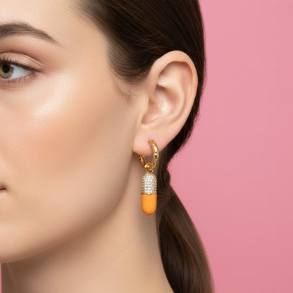Ontdek onze funky one-piece oorbellen: speels, vrolijk en vol charmante bedels die je look meteen een sprankje kleur en vreugde geven. Elke oorbel heeft een eigen karakter en zorgt voor een instant feel-good vibe. Mix &amp; match je eigen favorieten voor een unieke, eigenzinnige stijl.