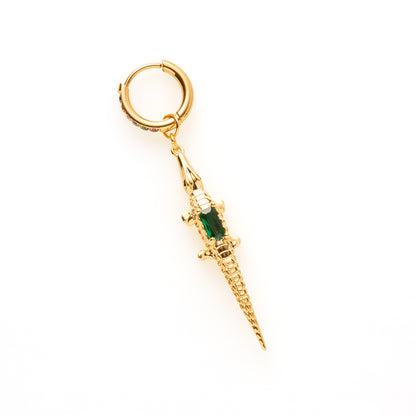 Laat je oor opvallen met Alligator Spark – een one piece oorbel met een brutale twist. Deze stijlvolle blikvanger combineert een kleurrijke zirkonia oorring met een funky krokodil bedel, die pronkt met een glinsterend groen detail. De perfecte mix van speels en chic – draag ‘m solo voor een edgy statement of combineer ‘m met meerdere oorbellen voor een eigenzinnige look.