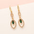 Green Spark straalt elegantie uit met een frisse twist. Deze fijne 18 kt gold plated oorhaakjes zijn voorzien van een sprankelende ovale zirkonia en een felgroen accentsteentje. Ideaal voor wie houdt van subtiele details en een levendig kleuraccent.